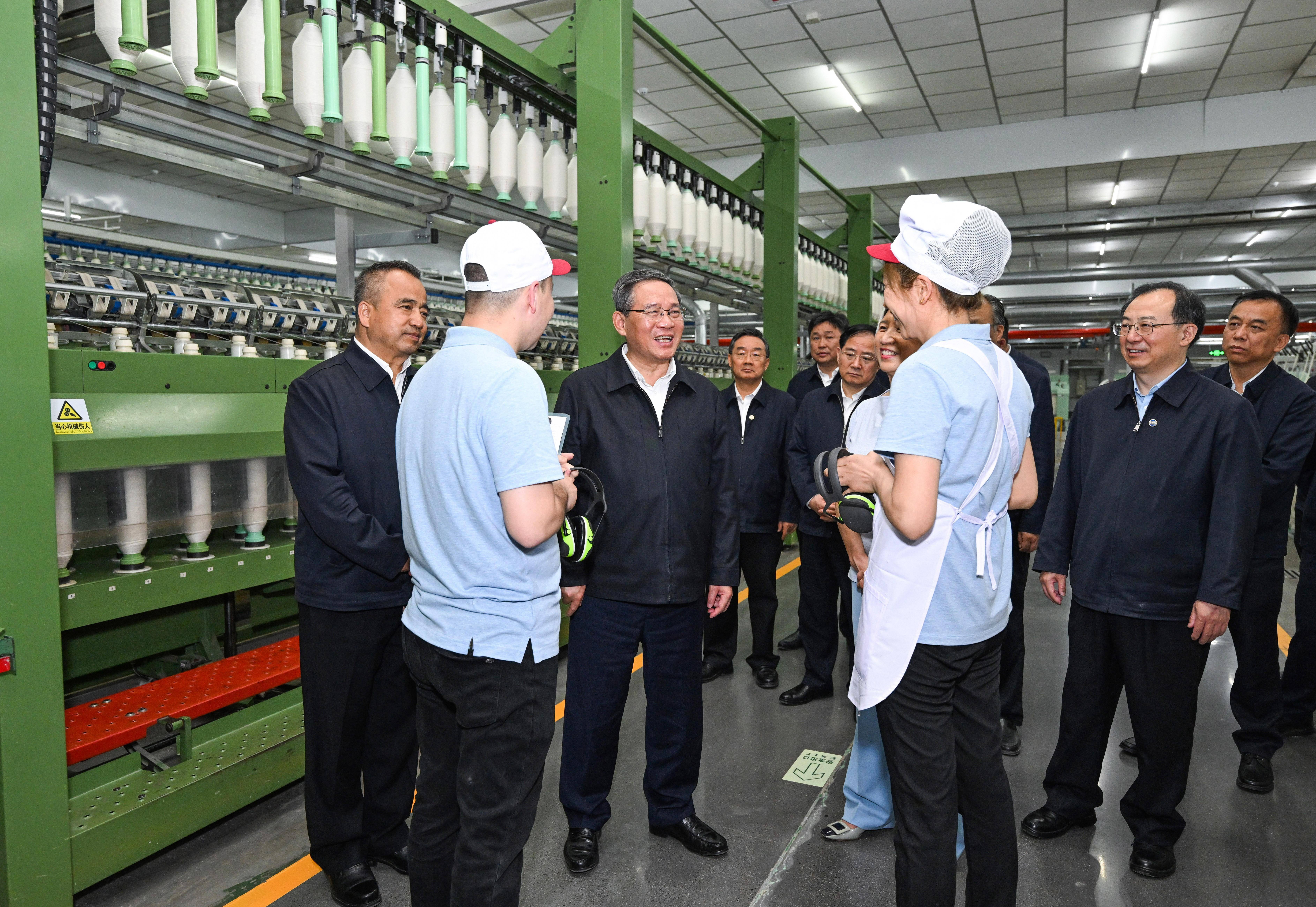 四维动力革命：解码李强总理政府工作报告中的中国经济“操作系统”升级