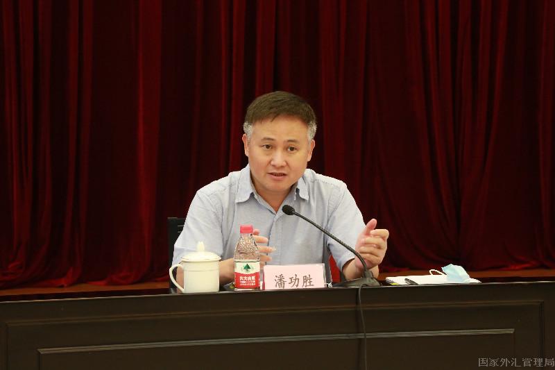 国家外汇管理局局长朱鹤新会见新加坡金管局副行长梁新松